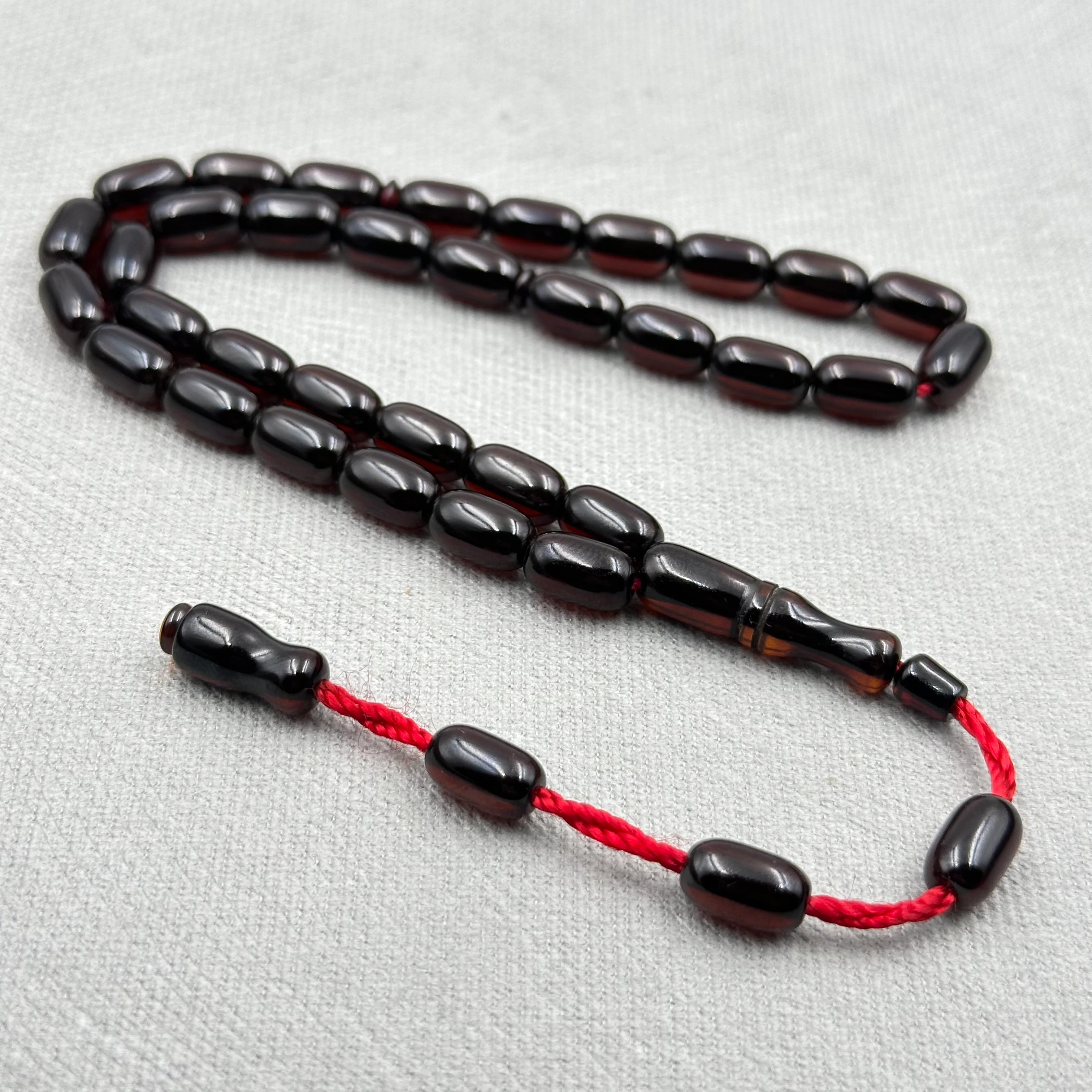 Kızıl Siyah Tonlu Parlak Kapsül Kesim Sıkma Kehribar Tespih